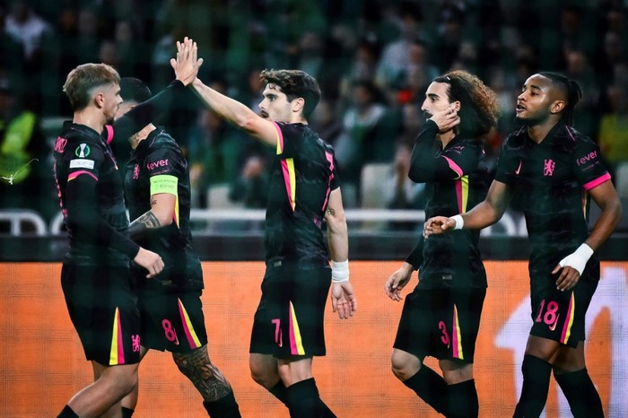 Chelseas players celebrate after scoring during the UEFA Conference League, League Phase - Matchday 2, football match between Panathinaikos FC and Chelsea FC at the Olympic Athletic Center in Athens on October 24, 2024. (Photo by Angelos TZORTZINIS / AFP)