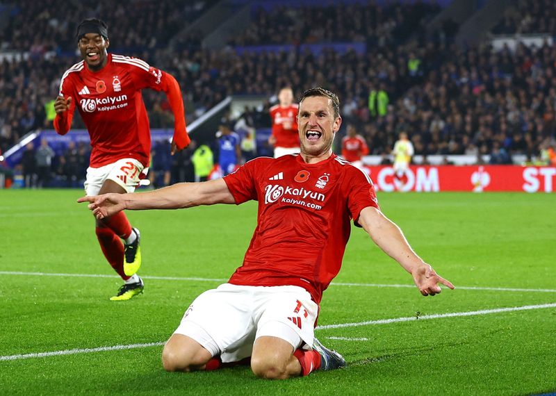 Soccer Football - Premier League - Leicester City v Nottingham Forest - King Power Stadium, Leicester, Britain - October 25, 2024 Nottingham Forest's Chris Wood celebrates scoring their third goal with Anthony Elanga and Callum Hudson-Odoi REUTERS/Molly Darlington EDITORIAL USE ONLY. NO USE WITH UNAUTHORIZED AUDIO, VIDEO, DATA, FIXTURE LISTS, CLUB/LEAGUE LOGOS OR 'LIVE' SERVICES. ONLINE IN-MATCH USE LIMITED TO 120 IMAGES, NO VIDEO EMULATION. NO USE IN BETTING, GAMES OR SINGLE CLUB/LEAGUE/PLAYER PUBLICATIONS. PLEASE CONTACT YOUR ACCOUNT REPRESENTATIVE FOR FURTHER DETAILS..