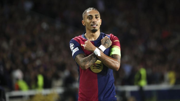 BARCELONA, SPAIN - OCTOBER 23: Raphinha of FC Barcelona celebrates after scoring a goal during the UEFA Champions League day 3 football match between FC Barcelona and FC Bayern Munich at the Estadi Olimpic Lluis Companys in Barcelona, Spain on October 23, 2024. (Photo by Adria Puig/Anadolu via Getty Images)