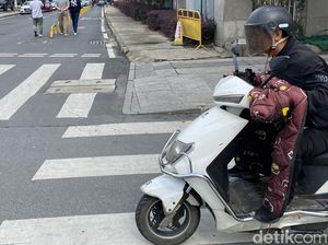 Brr... Pemotor di China Selimutan buat Halau Cuaca Dingin Brr... Pemotor di China Selimutan buat Halau Cuaca Dingin