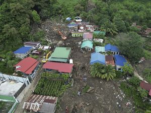 Badai Trami Picu Longsor di Filipina Badai Trami Picu Longsor di Filipina