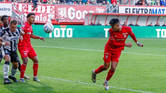 Enschede, Netherlands - October 27: Mees Hilgers of FC Twente shoots on goal and celebrates after scoring his sides first goal during the Eredivisie match between FC Twente 65 and Heracles Almelo at De Grolsch Veste on October 27, 2024 in Enschede, Netherlands. (Photo by Marcel ter Bals/DeFodi Images/DeFodi via Getty Images)