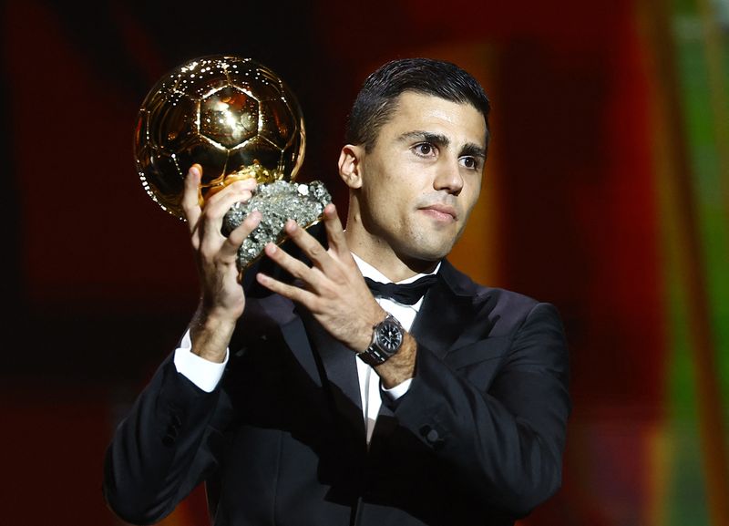 Soccer Football - Ballon d'Or - Theatre du Chatelet, Paris, France - October 28, 2024 Spain's and Manchester City's Rodri with the Ballon d'Or REUTERS/Sarah Meyssonnier
