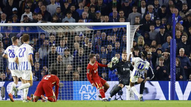 Soccer Football - Carabao Cup - Round of 16 - Brighton & Hove Albion v Liverpool - The American Express Community Stadium, Brighton, Britain - October 30, 2024 Liverpool's Cody Gakpo scores their first goal Action Images via Reuters/Peter Cziborra EDITORIAL USE ONLY. NO USE WITH UNAUTHORIZED AUDIO, VIDEO, DATA, FIXTURE LISTS, CLUB/LEAGUE LOGOS OR 'LIVE' SERVICES. ONLINE IN-MATCH USE LIMITED TO 120 IMAGES, NO VIDEO EMULATION. NO USE IN BETTING, GAMES OR SINGLE CLUB/LEAGUE/PLAYER PUBLICATIONS. PLEASE CONTACT YOUR ACCOUNT REPRESENTATIVE FOR FURTHER DETAILS..