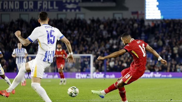 Soccer Football - Carabao Cup - Round of 16 - Brighton & Hove Albion v Liverpool - The American Express Community Stadium, Brighton, Britain - October 30, 2024 Liverpool's Cody Gakpo scores their first goal Action Images via Reuters/Peter Cziborra EDITORIAL USE ONLY. NO USE WITH UNAUTHORIZED AUDIO, VIDEO, DATA, FIXTURE LISTS, CLUB/LEAGUE LOGOS OR 'LIVE' SERVICES. ONLINE IN-MATCH USE LIMITED TO 120 IMAGES, NO VIDEO EMULATION. NO USE IN BETTING, GAMES OR SINGLE CLUB/LEAGUE/PLAYER PUBLICATIONS. PLEASE CONTACT YOUR ACCOUNT REPRESENTATIVE FOR FURTHER DETAILS..
