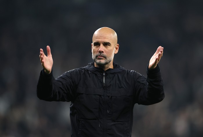 LONDON, ENGLAND - OCTOBER 30: Pep Guardiola Manager of Manchester City reacts during the Carabao Cup Fourth Round match between Tottenham Hotspur and Manchester City  at Tottenham Hotspur Stadium on October 30, 2024 in London, England. (Photo by Alex Pantling/Getty Images)