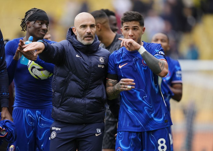 Enzo Maresca, Enzo Fernandez Chelsea manager Enzo Maresca (left) and Enzo Fernandez after the Premier League match at Molineux Stadium, Wolverhampton. Picture date: Sunday August 25, 2024. (Photo by Nick Potts/PA Images via Getty Images)