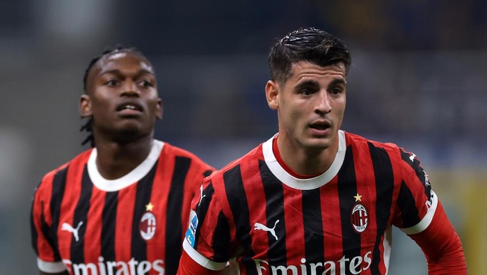 MILAN, ITALY - SEPTEMBER 22: Alvaro Morata and Rafael Leao of AC Milan during the Serie A match between FC Internazionale and AC Milan at Stadio Giuseppe Meazza on September 22, 2024 in Milan, Italy. (Photo by Jonathan Moscrop/Getty Images)