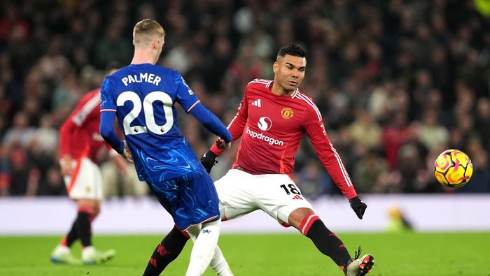 Chelseas Cole Palmer (left) and Manchester Uniteds Casemiro battle for the ball during the Premier League match at Old Trafford, Manchester. Picture date: Sunday November 3, 2024. (Photo by Martin Rickett/PA Images via Getty Images)