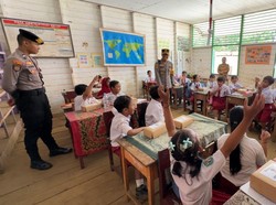Polres Kutai Barat Bagikan 1.500 Paket Makan Bergizi Gratis ke Siswa SD-SMA