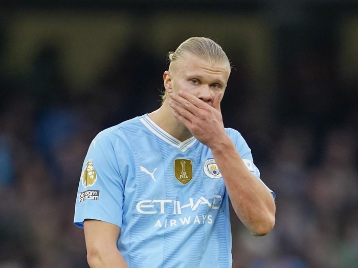 Manchester City's Erling Haaland reacts during the English Premier League soccer match between Manchester City and Arsenal at the Etihad stadium in Manchester, England, Sunday, March 31, 2024. (AP Photo/Dave Thompson)