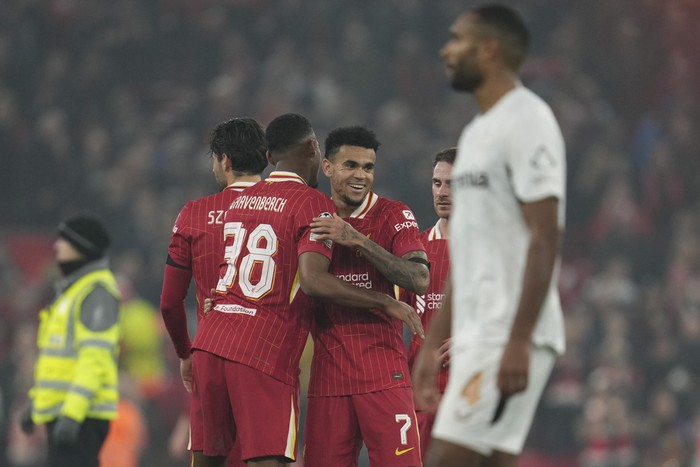 Liverpool, Luis Diaz Liverpool's Luis Diaz, center, celebrates with teammates at the end of the Champions League opening phase soccer match between Liverpool and Bayer Leverkusen at Anfield in Liverpool, England, Tuesday, Nov. 5, 2024. (AP Photo/Jon Super)