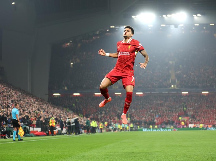 LIVERPOOL, ENGLAND - NOVEMBER 05: Luis Diaz of Liverpool celebrates scoring his team's first goal during the UEFA Champions League 2024/25 League Phase MD4 match between Liverpool FC and Bayer 04 Leverkusen at Anfield on November 05, 2024 in Liverpool, England. (Photo by Carl Recine/Getty Images)