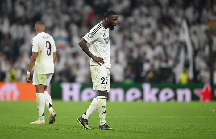 MADRID, SPAIN - NOVEMBER 05: Antonio Ruediger of Real Madrid reacts at full-time following the teams defeat in the UEFA Champions League 2024/25 League Phase MD4 match between Real Madrid C.F. and AC Milan at Estadio Santiago Bernabeu on November 05, 2024 in Madrid, Spain. (Photo by Michael Regan - UEFA/UEFA via Getty Images)