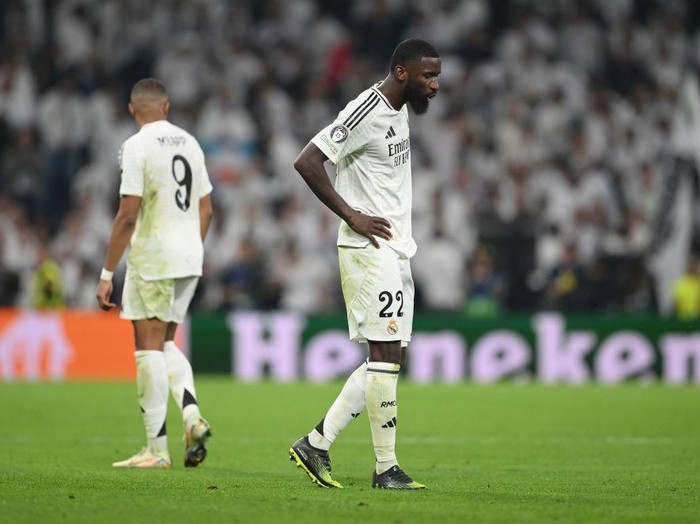 MADRID, SPAIN - NOVEMBER 05: Antonio Ruediger of Real Madrid reacts at full-time following the teams defeat in the UEFA Champions League 2024/25 League Phase MD4 match between Real Madrid C.F. and AC Milan at Estadio Santiago Bernabeu on November 05, 2024 in Madrid, Spain. (Photo by Michael Regan - UEFA/UEFA via Getty Images)