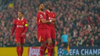 Liverpool ada di puncak klasemen dengan 12 poin usai meraih empat kemenangan. Mereka mengalahkan AC Milan 3-1, Bologna 2-0, RB Leipzig 1-0, dan terbaru Bayer Leverkusen 4-0. Foto: NurPhoto via Getty Images/NurPhoto