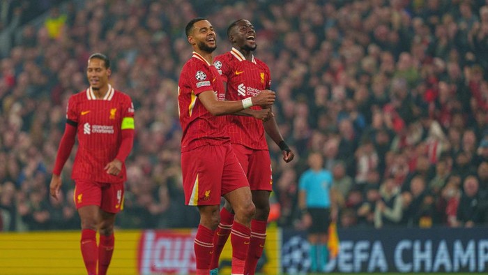 Liverpool's Cody Gakpo celebrates after scoring their second goal during the UEFA Champions League 2024/25 League Phase MD4 match between Liverpool and Bayer Leverkusen at Anfield in Liverpool, England, on November 5, 2024. (Photo by MI News/NurPhoto via Getty Images)