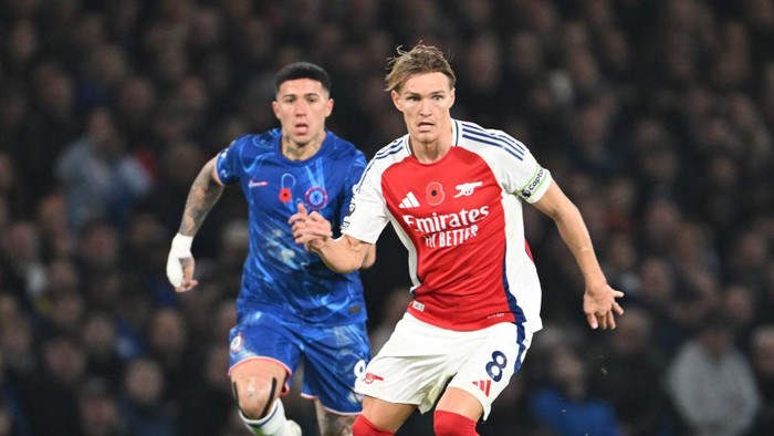 LONDON, ENGLAND - NOVEMBER 10: Martin Odegaard of Arsenal during the Premier League match between Chelsea FC and Arsenal FC at Stamford Bridge on November 10, 2024 in London, England. (Photo by Stuart MacFarlane/Arsenal FC via Getty Images)