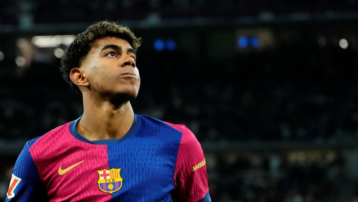 Lamine Yamal right winger of Barcelona and Spain during the La Liga match between Real Madrid CF and FC Barcelona at Estadio Santiago Bernabeu on October 27, 2024 in Madrid, Spain. (Photo by Jose Breton/Pics Action/NurPhoto via Getty Images)