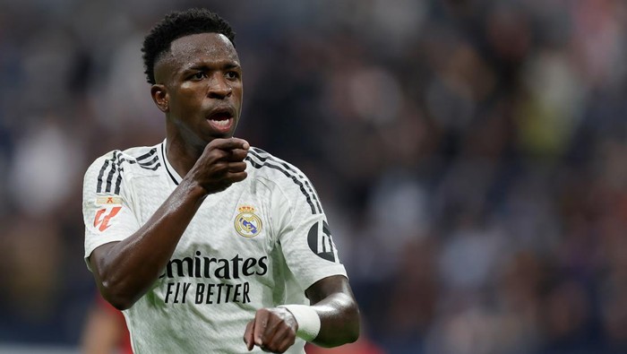  Vinicius Junior of Real Madrid celebrates 4-0 during the LaLiga EA Sports match between Real Madrid v Osasuna at the Estadio Santiago Bernabeu on November 9, 2024 in Madrid Spain (Photo by Maria Gracia Jimenez/Soccrates/Getty Images)