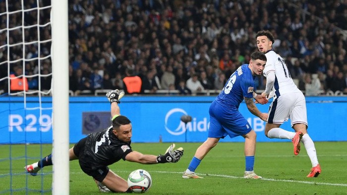 ATHENS, GREECE - NOVEMBER 14: Curtis Jones of England scores his teams third goal during the UEFA Nations League 2024/25 League B Group B2 match between Greece and England at Athens Olympic Stadium on November 14, 2024 in Athens, Greece. (Photo by Justin Setterfield/Getty Images)
