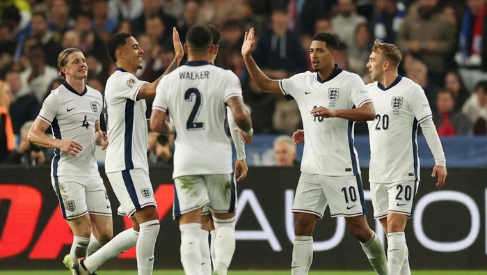 Soccer Football - Nations League - Group Stage - Greece v England - Athens Olympic Stadium, Athens, Greece - November 14, 2024 Englands Jarrod Bowen, Englands Conor Gallagher, Englands Jude Bellingham and Englands Morgan Rogers celebrate their second goal an own goal scored by Greeces Odisseas Vlachodimos Action Images via Reuters/Paul Childs