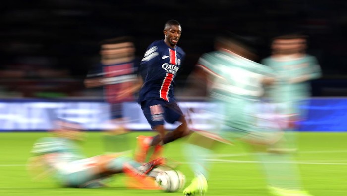 PARIS, FRANCE - NOVEMBER 06: Ousmane Dembele of Paris Saint-Germain runs with the ball during the UEFA Champions League 2024/25 League Phase MD4 match between Paris Saint-Germain and Atletico de Madrid at Parc des Princes on November 06, 2024 in Paris, France. (Photo by Julian Finney - UEFA/UEFA via Getty Images)
