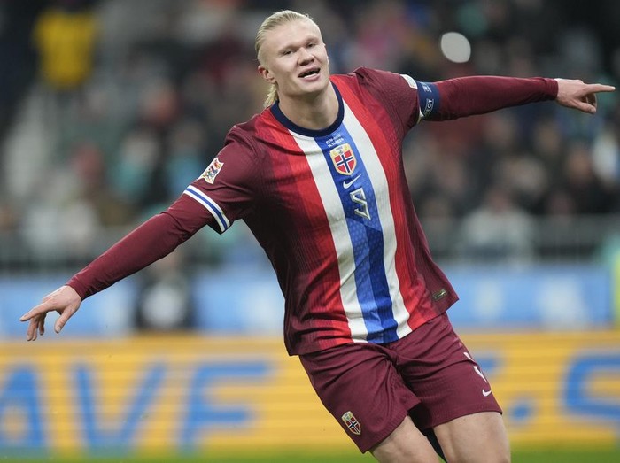 Norway's Erling Haaland celebrates after scoring during the UEFA Nations League soccer match between Slovenia and Norway at Stozice stadium in Ljubljana, Slovenia, Thursday, Nov. 14, 2024. (AP Photo/Darko Bandic)
