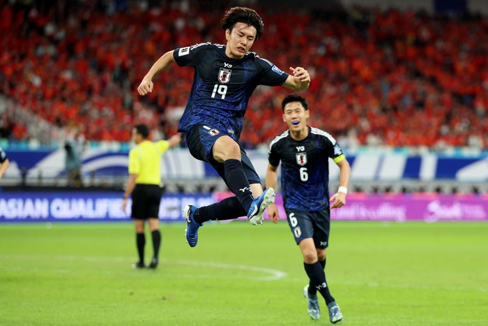 XIAMEN, CHINA - NOVEMBER 19: Koki Ogawa of Japan celebrates after scoring the teams first goal against China in the first half during the FIFA World Cup Asian 3rd Qualifier Group C match on November 19, 2024 in Xiamen, China.  (Photo by Lintao Zhang/Getty Images)