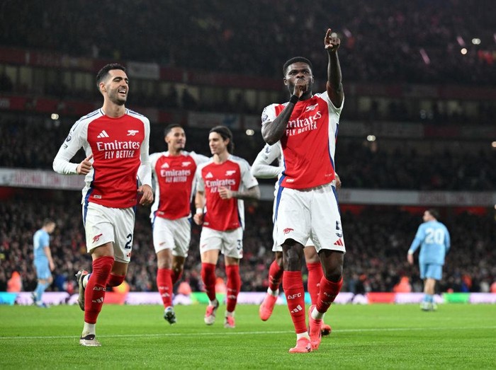 LONDON, ENGLAND - NOVEMBER 23: Thomas Partey of Arsenal celebrates scoring his teams second goal during the Premier League match between Arsenal FC and Nottingham Forest FC at Emirates Stadium on November 23, 2024 in London, England. (Photo by Stuart MacFarlane/Arsenal FC via Getty Images)