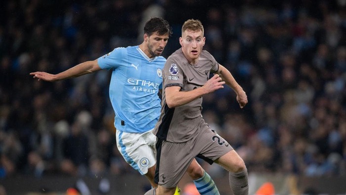 MANCHESTER, ENGLAND - DECEMBER 3: Dejan Kulusevski of Tottenham Hotspur and Ruben Dias of Manchester City in action during the Premier League match between Manchester City and Tottenham Hotspur at Etihad Stadium on December 3, 2023 in Manchester, England. (Photo by Joe Prior/Visionhaus via Getty Images)