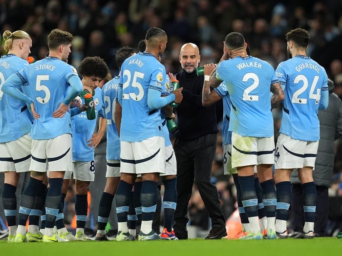 Manchester City manager Pep Guardiola gives a pep talk to the players from the touchline during the Premier League match at the Etihad Stadium, Manchester. Picture date: Saturday November 23, 2024. (Photo by Martin Rickett/PA Images via Getty Images)