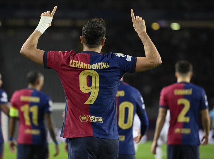 BARCELONA, SPAIN - NOVEMBER 26: Barcelona's Polish forward Robert Lewandowski celebrates his goal during the UEFA Champions League football match between FC Barcelona and Stade Brestois at the Estadi Olimpic Lluis Companys, in Barcelona, on November 26, 2024. (Photo by Adria Puig/Anadolu via Getty Images)