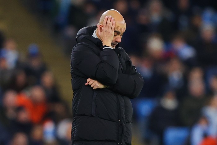 MANCHESTER, ENGLAND - NOVEMBER 26: Josep Pep Guardiola, manager of Manchester City, looks dejected during the UEFA Champions League 2024/25 League Phase MD5 match between 	Manchester City and Feyenoord at City of Manchester Stadium on November 26, 2024 in Manchester, England. (Photo by James Gill - Danehouse/Getty Images)