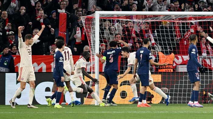 SOCCER-CHAMPIONS-FCB-PSG/REPORT Soccer Football - Champions League - Bayern Munich v Paris St Germain - Allianz Arena, Munich, Germany - November 26, 2024 Bayern Munichs Kim Min-jae celebrates scoring their first goal with Dayot Upamecano REUTERS/Angelika Warmuth
