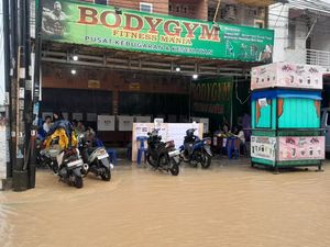 Banyak Warga Tak Nyoblos karena Banjir di Medan Banyak Warga Tak Nyoblos karena Banjir di Medan
