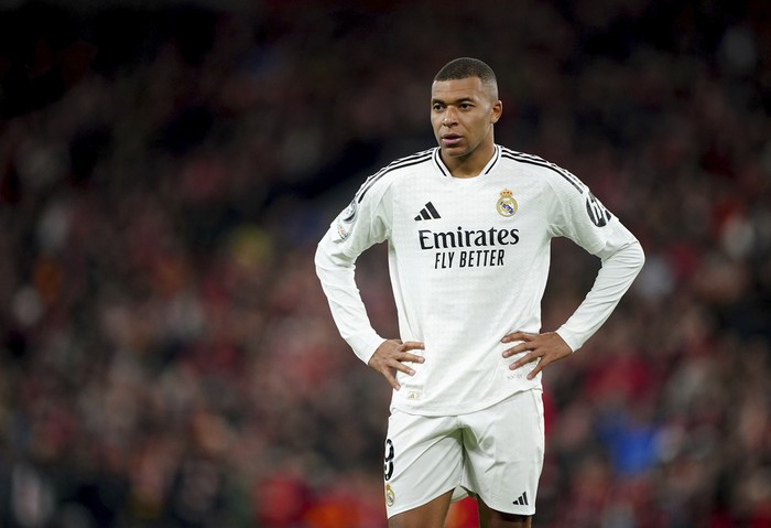 Real Madrids Kylian Mbappe stands on the pitch during the Champions League opening phase soccer match between Liverpool and Real Madrid at Anfield Stadium, Liverpool, England, Wednesday, Nov. 27, 2024.  (Peter Byrne/PA via AP)