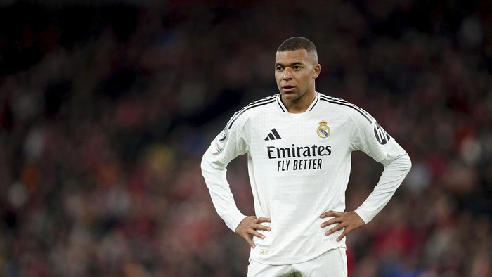 Real Madrids Kylian Mbappe stands on the pitch during the Champions League opening phase soccer match between Liverpool and Real Madrid at Anfield Stadium, Liverpool, England, Wednesday, Nov. 27, 2024.  (Peter Byrne/PA via AP)