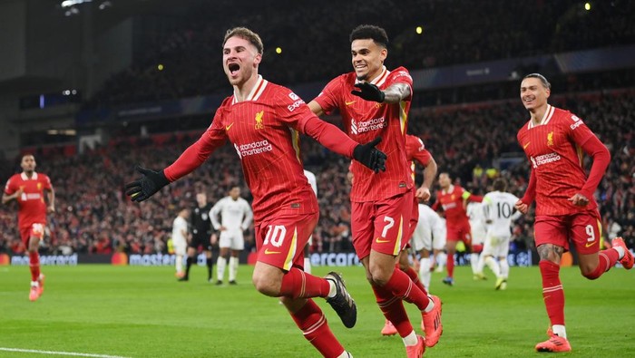 LIVERPOOL, ENGLAND - NOVEMBER 27: Alexis Mac Allister of Liverpool celebrates scoring his teams first goal during the UEFA Champions League 2024/25 League Phase MD5 match between Liverpool FC and Real Madrid C.F. at Anfield on November 27, 2024 in Liverpool, England. (Photo by Justin Setterfield/Getty Images)