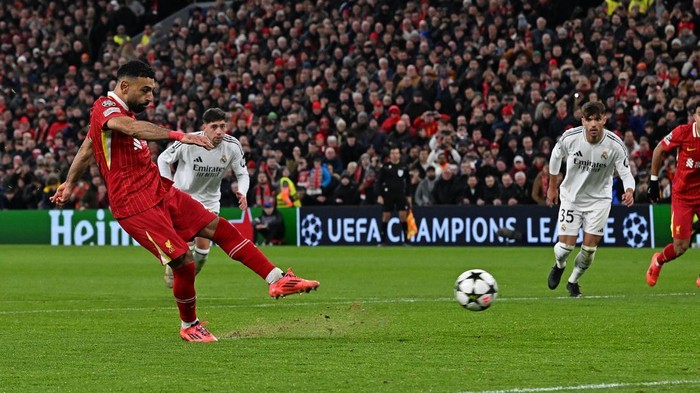 LIVERPOOL, ENGLAND - NOVEMBER 27: (THE SUN OUT, THE SUN ON SUNDAY OUT) Mohamed Salah of Liverpool misses from the spot during the UEFA Champions League 2024/25 League Phase MD5 match between Liverpool FC and Real Madrid C.F. at Anfield on November 27, 2024 in Liverpool, England. (Photo by John Powell/Liverpool FC via Getty Images)