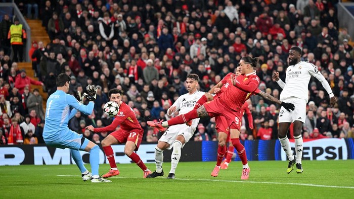 LIVERPOOL, ENGLAND - NOVEMBER 27: Thibaut Courtois of Real Madrid makes a save from Darwin Nunez of Liverpool during the UEFA Champions League 2024/25 League Phase MD5 match between Liverpool FC and Real Madrid C.F. at Anfield on November 27, 2024 in Liverpool, England. (Photo by Michael Regan - UEFA/UEFA via Getty Images)