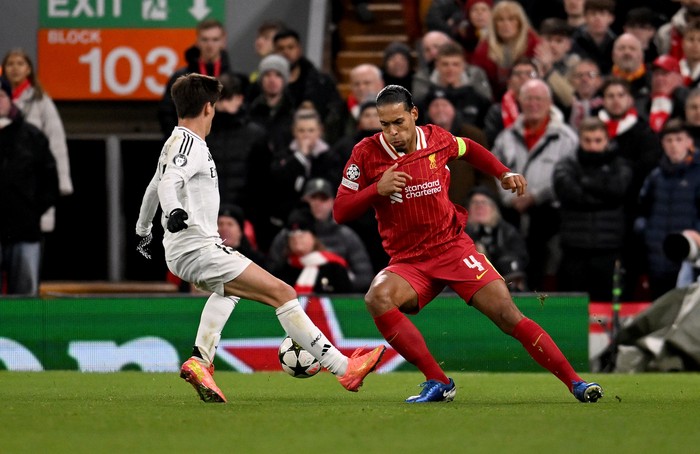 LIVERPOOL, ENGLAND - NOVEMBER 27: (THE SUN OUT, THE SUN ON SUNDAY OUT) Virgil van Dijk captain of Liverpool during the UEFA Champions League 2024/25 League Phase MD5 match between Liverpool FC and Real Madrid C.F. at Anfield on November 27, 2024 in Liverpool, England. (Photo by Andrew Powell/Liverpool FC via Getty Images)