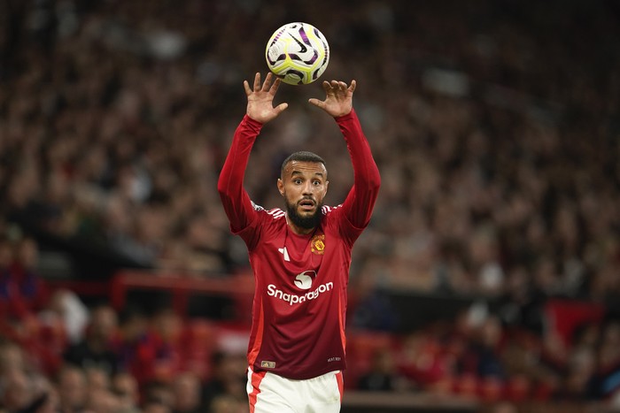 Noussair Mazraoui Manchester United's Noussair Mazraoui takes a throw-in during the English Premier League soccer match between Manchester United and Fulham at Old Trafford, Friday, Aug. 16, 2024, in Manchester, England. (AP Photo/Dave Thompson)