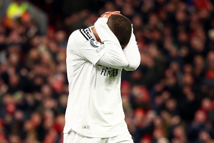 LIVERPOOL, ENGLAND - NOVEMBER 27: Kylian Mbappe of Real Madrid reacts after missing a penalty during the UEFA Champions League 2024/25 League Phase MD5 match between Liverpool FC and Real Madrid C.F. at Anfield on November 27, 2024 in Liverpool, England. (Photo by Chris Brunskill/Fantasista/Getty Images)