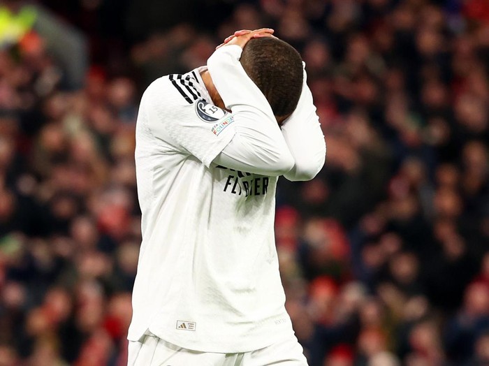 LIVERPOOL, ENGLAND - NOVEMBER 27: Kylian Mbappe of Real Madrid reacts after missing a penalty during the UEFA Champions League 2024/25 League Phase MD5 match between Liverpool FC and Real Madrid C.F. at Anfield on November 27, 2024 in Liverpool, England. (Photo by Chris Brunskill/Fantasista/Getty Images)