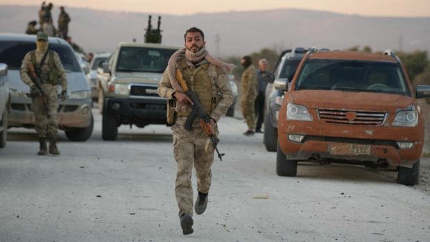 Anti-government fighters reach the highway near the the northern Syrian town of Azaz on December 1, 2024. The United States and its allies France, Germany and Britain called Sunday for 