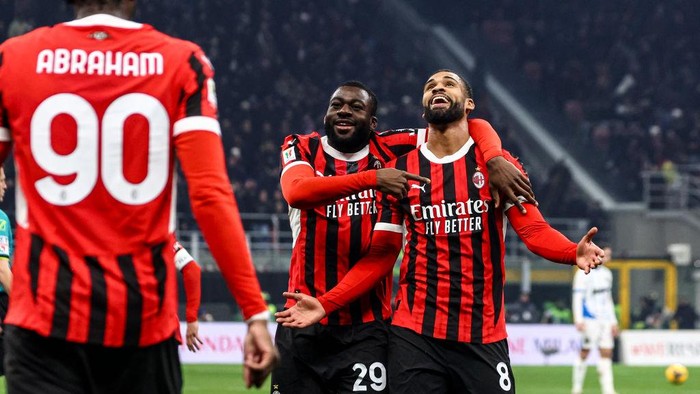 MILAN, ITALY - DECEMBER 03: Youssouf Fofana of AC Milan and Ruben Loftus-Cheek celebrates after his team-mate Rafael Leao  scored during the Coppa Italia match between AC Milan and Sassuolo at Stadio Giuseppe Meazza on December 03, 2024 in Milan, Italy. (Photo by Giuseppe Cottini/AC Milan via Getty Images)