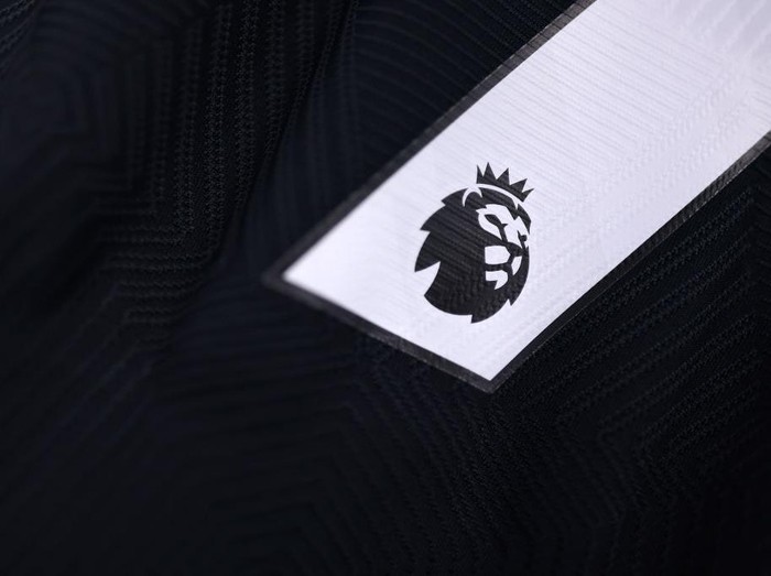 LIVERPOOL, ENGLAND - DECEMBER 04: A detailed view of the Premier League logo, seen on a Wolverhampton Wanderers match shirt inside the dressing room prior to the Premier League match between Everton FC and Wolverhampton Wanderers FC at Goodison Park on December 04, 2024 in Liverpool, England. (Photo by Jack Thomas - WWFC/Wolves via Getty Images)