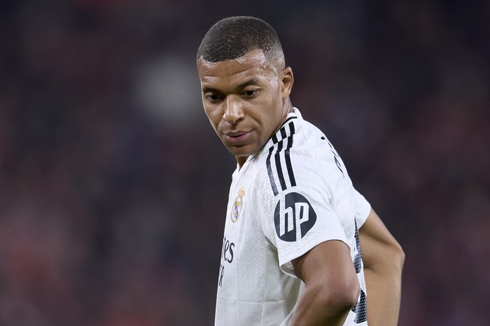 Kylian Mbappe BILBAO, SPAIN - DECEMBER 03: Kylian Mbappe of Real Madrid CF looks on during the LaLiga EA Sports match between Athletic Club and Real Madrid CF at Estadio de San Mames on December 03, 2024 in Bilbao, Spain. (Photo by Ion Alcoba Beitia/Getty Images)