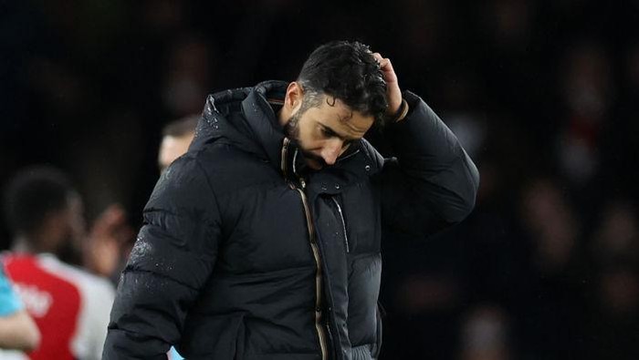 LONDON, ENGLAND - DECEMBER 04: Ruben Amorim Manager / Head Coach of Manchester United looks dejected after the Premier League match between Arsenal FC and Manchester United FC at Emirates Stadium on December 04, 2024 in London, England. (Photo by Catherine Ivill - AMA/Getty Images)